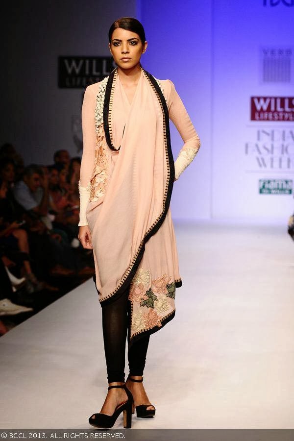 A model walks the ramp for fashion designer Pallavi Singhee on Day 5 of Wills Lifestyle India Fashion Week (WIFW) Spring/Summer 2014, held in Delhi.<br /> 