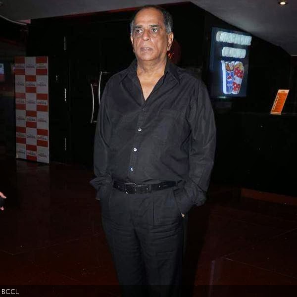 Veteran filmmaker Pehlaj Nihalani attends the premiere of Bengali movie Mishawr Rahasya, held at Cinemax, in Mumbai, on October 9, 2013. (Pic: Viral Bhayani)