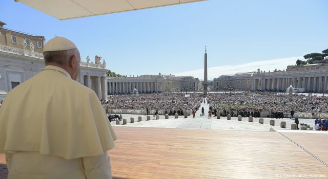 Pope Francis looks out on the crowd during a special jubilee audience in St. Peter's Square at the Vatican June 18. The pope is holding additional audiences during the Holy Year of Mercy. (CNS/L'Osservatore Romano)
