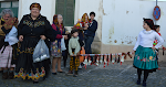 Desfile com chouriços e dinheiro pendurado