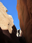 Climbing over a boulder