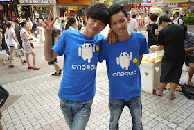 two employees wearing Android shirts in Shenzhen, China