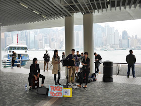musical group Poco A Poco performing at the Kowloon Public Pier