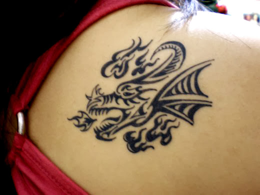 girl dragon tattoo