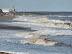 Crashing waves up the beach to Sizewell