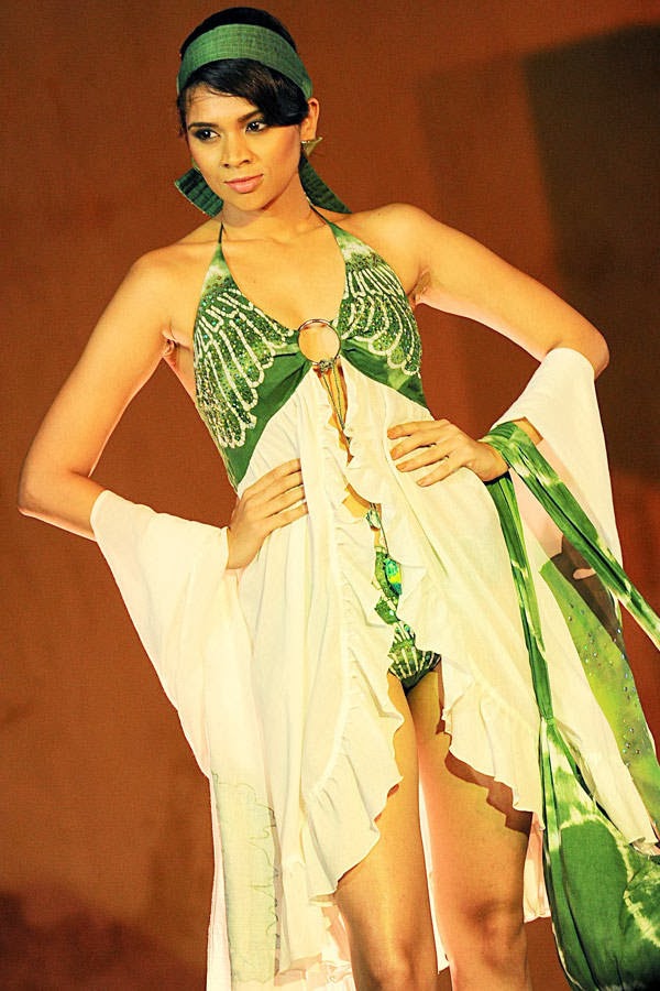 A model displays a creation by fashion designer Hameedia at the annual Sri Lankan HSBC Resort fashion week in Galle on October 5, 2013.