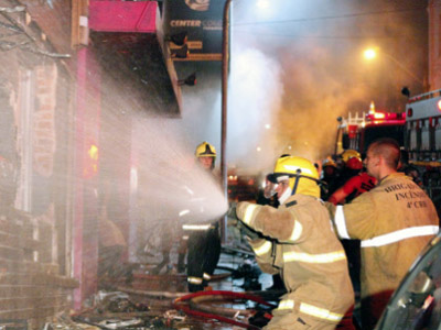 Firefighters try to put out a fire at a nightclub in Santa Maria, 550 Km from Porto Alegre, southern Brazil.