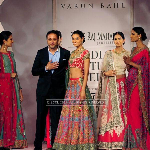 Kanishtha on the ramp with Varun Bahl on Day 3 of India Couture Week, 2014, held at Taj Palace hotel, New Delhi. 