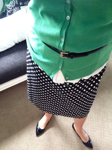 Fashion Friday green cardigan with black and white polka dot skirt