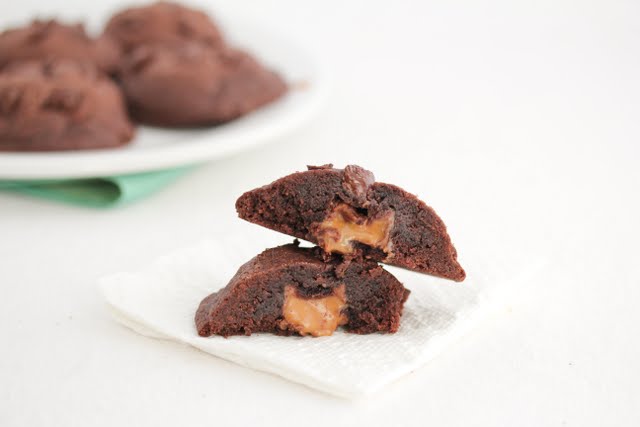 photo of one Gooey Caramel Chocolate Cookie split in half