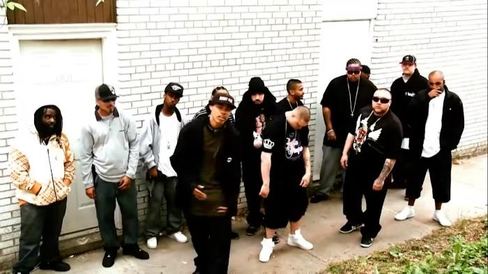 A group of people posing for a photo
Description automatically generated