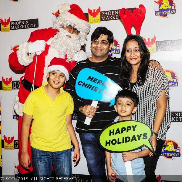 Kiku and Priyanka Sharda with their children during pre-christmas party, held at Amoeba, in Mumbai, on December 18, 2013.