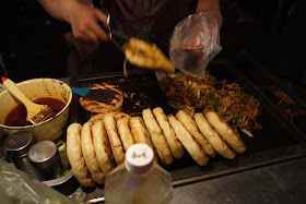 grilled meat and veggies in bread at Zhengning Street Night Market in Lanzhou, China
