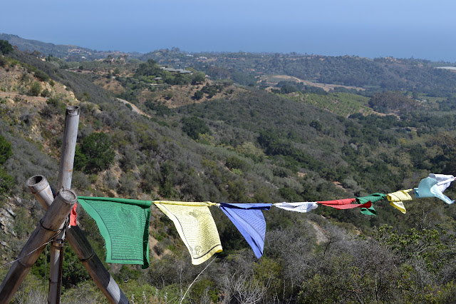prayer flags wrapping around the cord