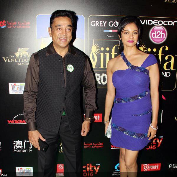 Kamal Hassan arrives with a guest during the14th International Indian Film Academy (IIFA) 2013 Rocks event, held at The Venetian hotel in Macau, on July 5, 2013. (Pic: Viral Bhayani)