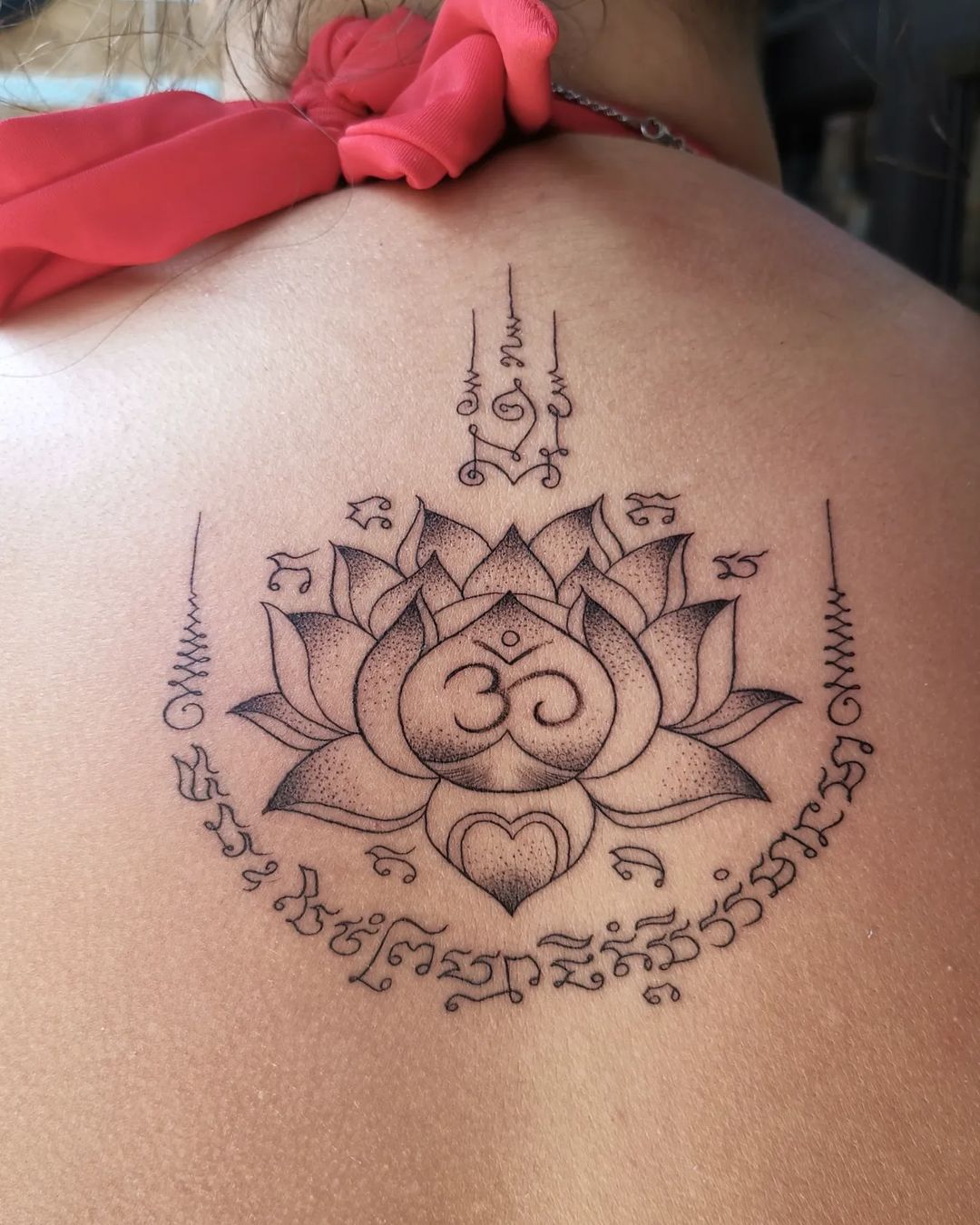Lotus Flower With Om Tattoo