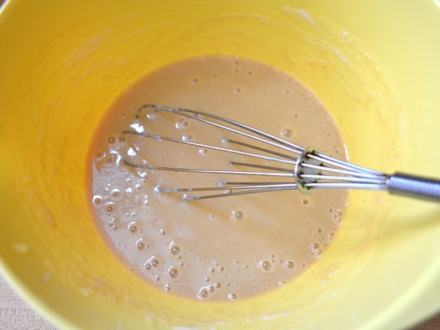 mixed wet ingredients in mixing bowl with whisk 