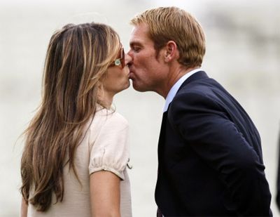 Former cricketer Shane Warne spotted locking lips with girlfriend Elizabeth Hurley after the fourth day of the third test match at the Edgbaston Cricket Ground, Birmingham, England on August 13, 2011.