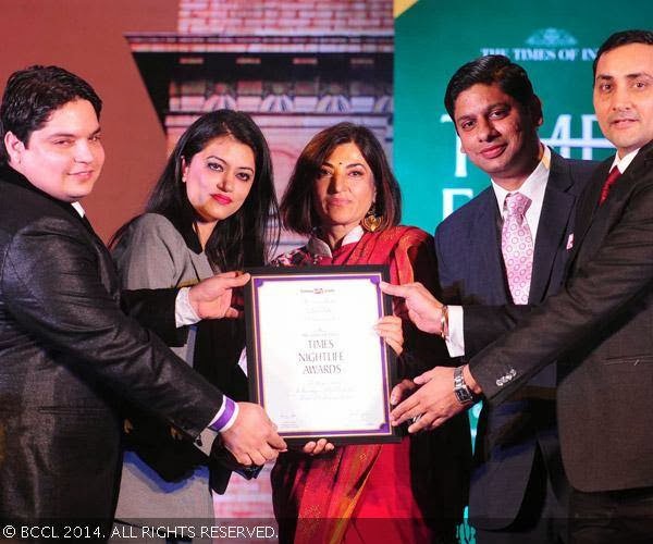 Ambika Shukla gives the award for Best Nightclub (Delhi)Luxurious Nightout to Sahil, Ashima Beroya, Harshv, Ved Prakash of G-bar during Times Food Guide & Nightlife Awards, held at ITC Maurya Sheraton in New Delhi.<br /> 