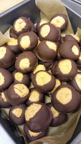Buckeye Balls - peanut butter, vanilla, sugar, then dipped in chocolate