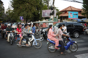 motorbikes at a crowded interestion in Phnom Penh
