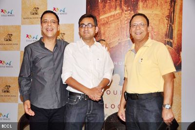 (L-R) Vidhu Vinod Chopra, author Rahul Pandita and Vir Chopra seen during a photo op at the launch of Rahul's latest book 'Our Moon Has Blood Clots', held at Title Waves Book Store in Mumbai on February 4, 2013. (Pic: Viral Bhayani)
