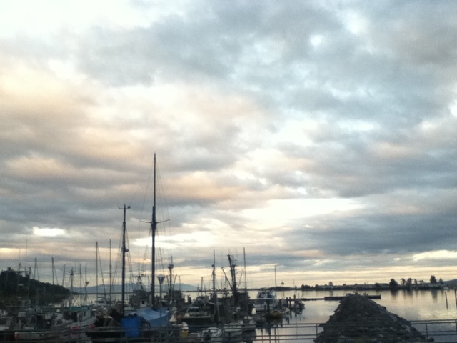 Sunset on clouds above Comox Marina