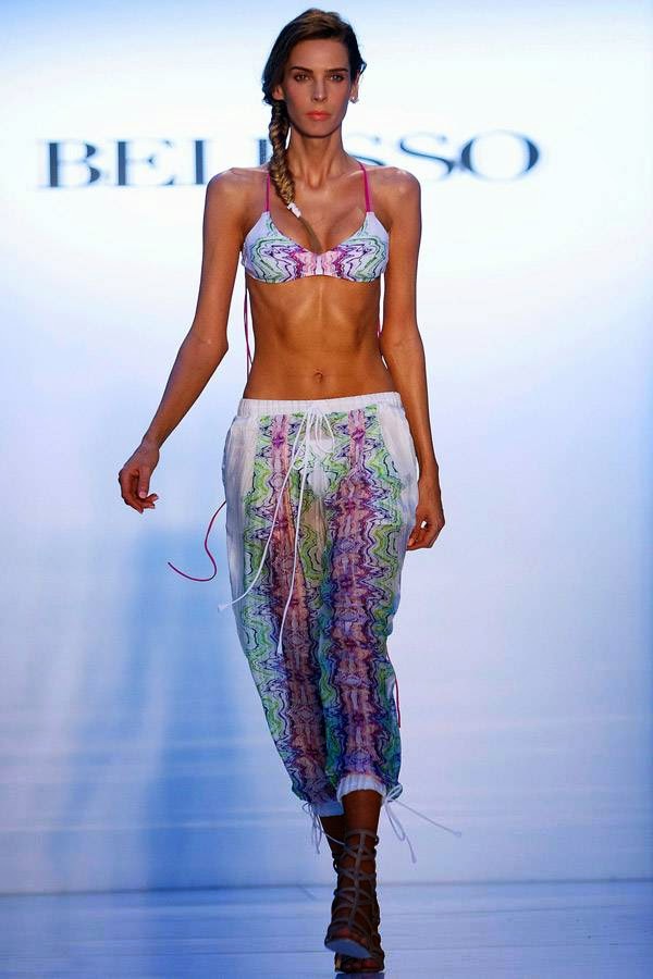 A model presents a creation of the Belusso collection during Mercedes-Benz Fashion Week Swim in Miami, July 20, 2014. 