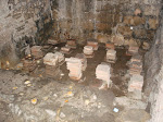 Tile pillars that used to support the steam room floors