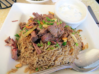 Baltimore Lebanese Taverna Ouzi dish of braised lamb, spiced rice, yogurt sauce