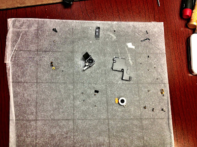 Tiny small parts from the inside of an iPhone.