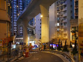 Hill Road in Shek Tong Tsui, Hong Kong, during the evening