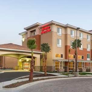 Hampton Inn & Suites San Bernardino logo