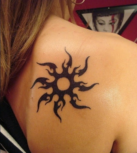 tribal sun tattoo designs on the upper back