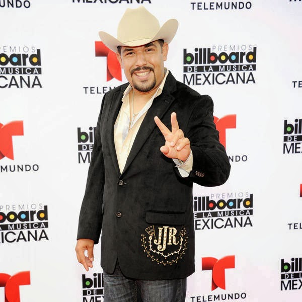Juan Jose Rendon gestures as he arrives for the 3rd Annual Billboard Mexican Awards, held at The Dolby Theatre in Los Angeles on October 9, 2013.