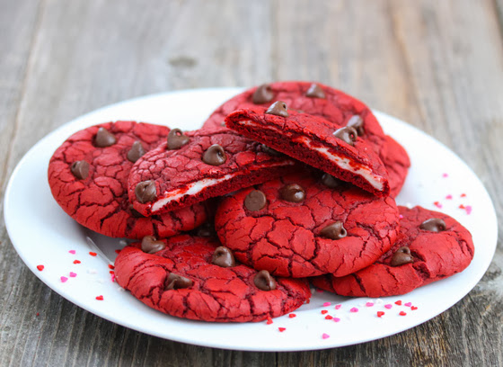 photo of a pile of Red Velvet and Cream Cheese Cookies on a white plate