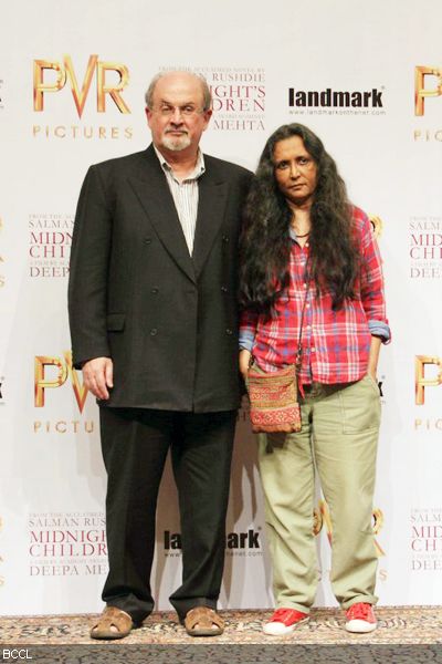 Indian born British author Salman Rushdie with director Deepa Mehta pose together during the press meet of the movie 'Midnight's Children', held in Mumbai on January 29, 2013. (Pic: Viral Bhayani)