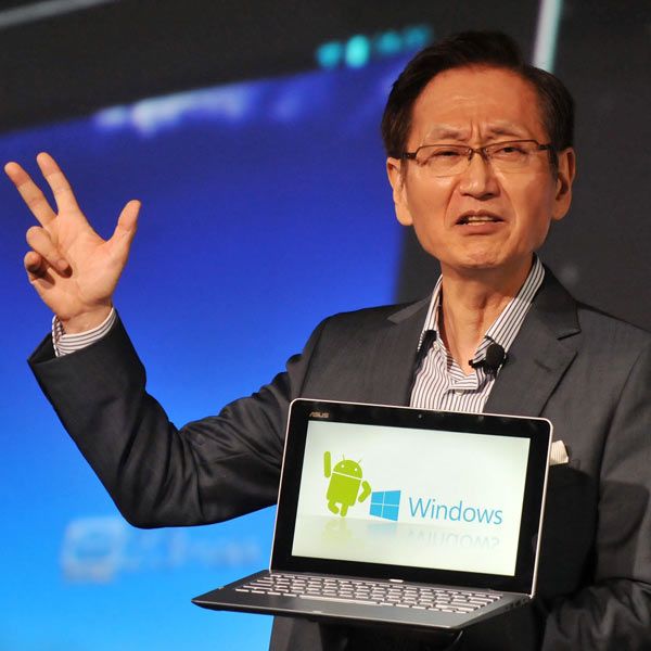 Jonney Shih introduces its new product called the 'ASUS Transformer Book Trio', the world's first three-in-one mobile device during a press conference ahead of the opening of the Computex trade fair in Taipei on June 3, 2013.