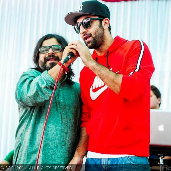 Ranbir Kapoor performs with Pritam during Saraswati puja hosted by Anurag Basu and Pritam, in Mumbai. 