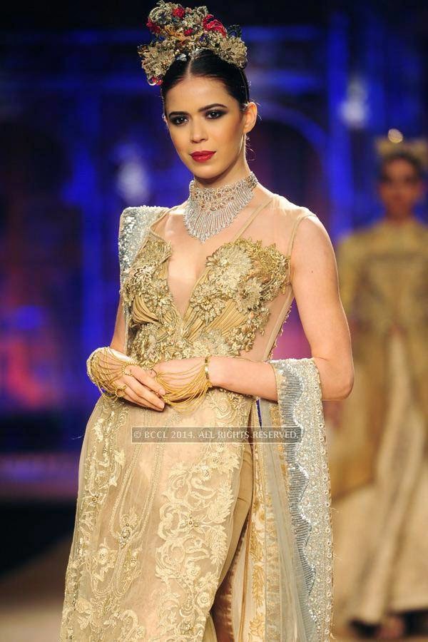 A model walks the ramp for Sulakshana on Day 6 of India Couture Week, 2014, held at Taj Palace hotel, New Delhi.