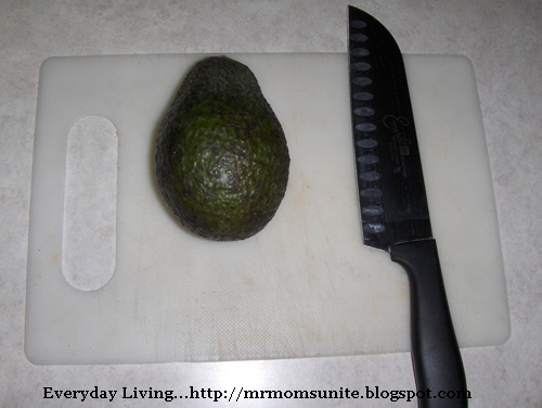photo of avocado, knife, and spoon