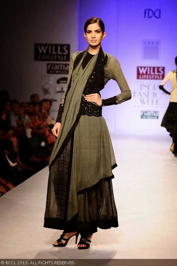 Margarita showcases a creation by fashion designer Pallavi Singhee on Day 5 of Wills Lifestyle India Fashion Week (WIFW) Spring/Summer 2014, held in Delhi.