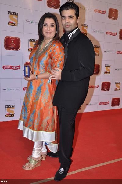Farah Khan and Karan Johar strike a pose for the lensman during the Stardust Awards 2013, held in Mumbai on January 26, 2013. (Pic: Viral Bhayani)