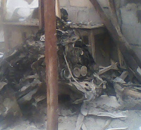 Photo of the suicide bombers’ destroyed car. Credit Compass Direct News.