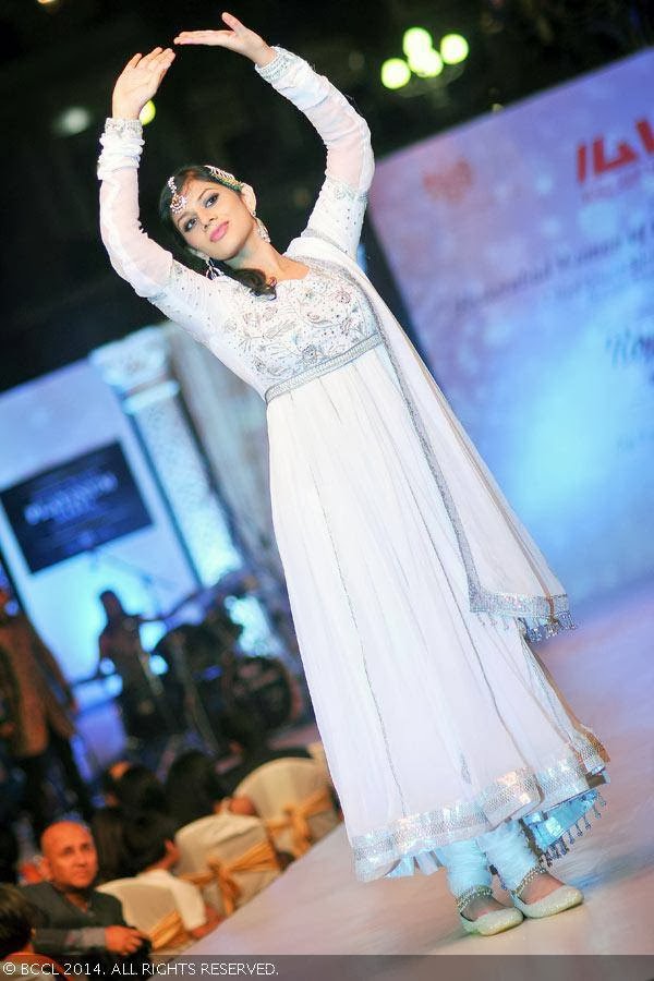 A model walks the ramp during Assocham fashion show, held at Taj Falaknuma Palace in Hyderabad.