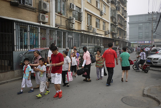 students leaving elementary school in Beijing