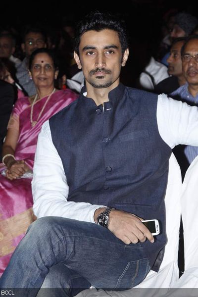 Handsome Kunal Kapoor watches the proceedings during 'Global Sounds Of Peace' music concert, held at Andheri Sports Complex in Mumbai on January 30, 2013. (Pic: Viral Bhayani)