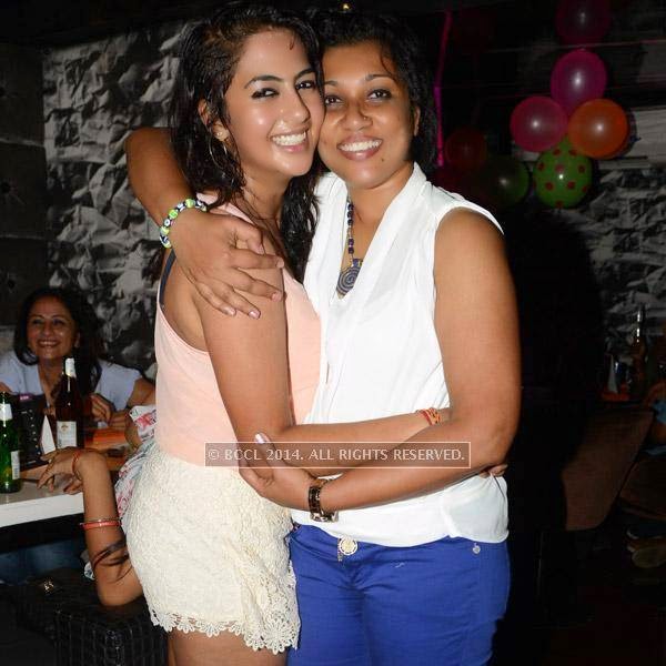 Kirthi and Ditta are all smiles during a get-together party at Pub Illusions.