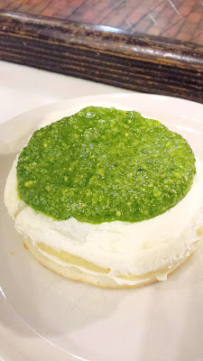 Crumpet Shop crumpet with ricotta and pesto, by Pike Place Market
