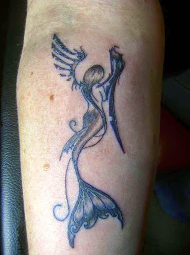 small beautiful Mermaid Tattoos on leg 